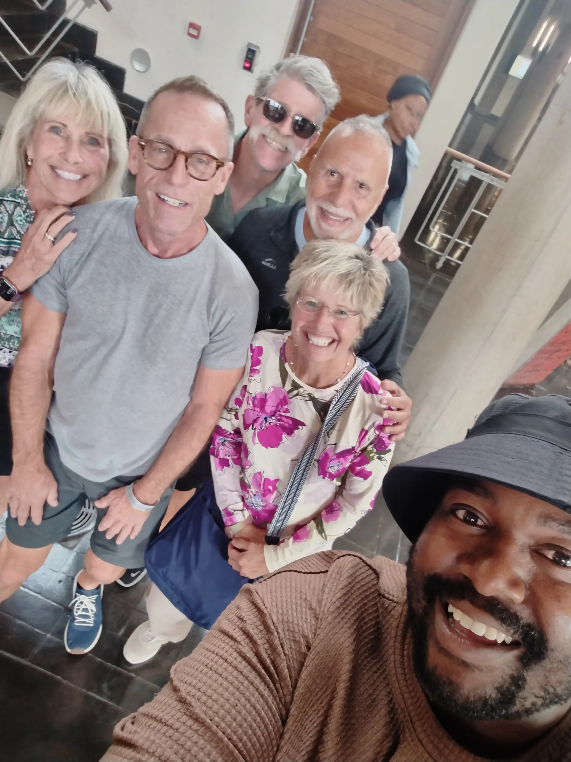African tour guide storytelling with a group of visitors in South Africa